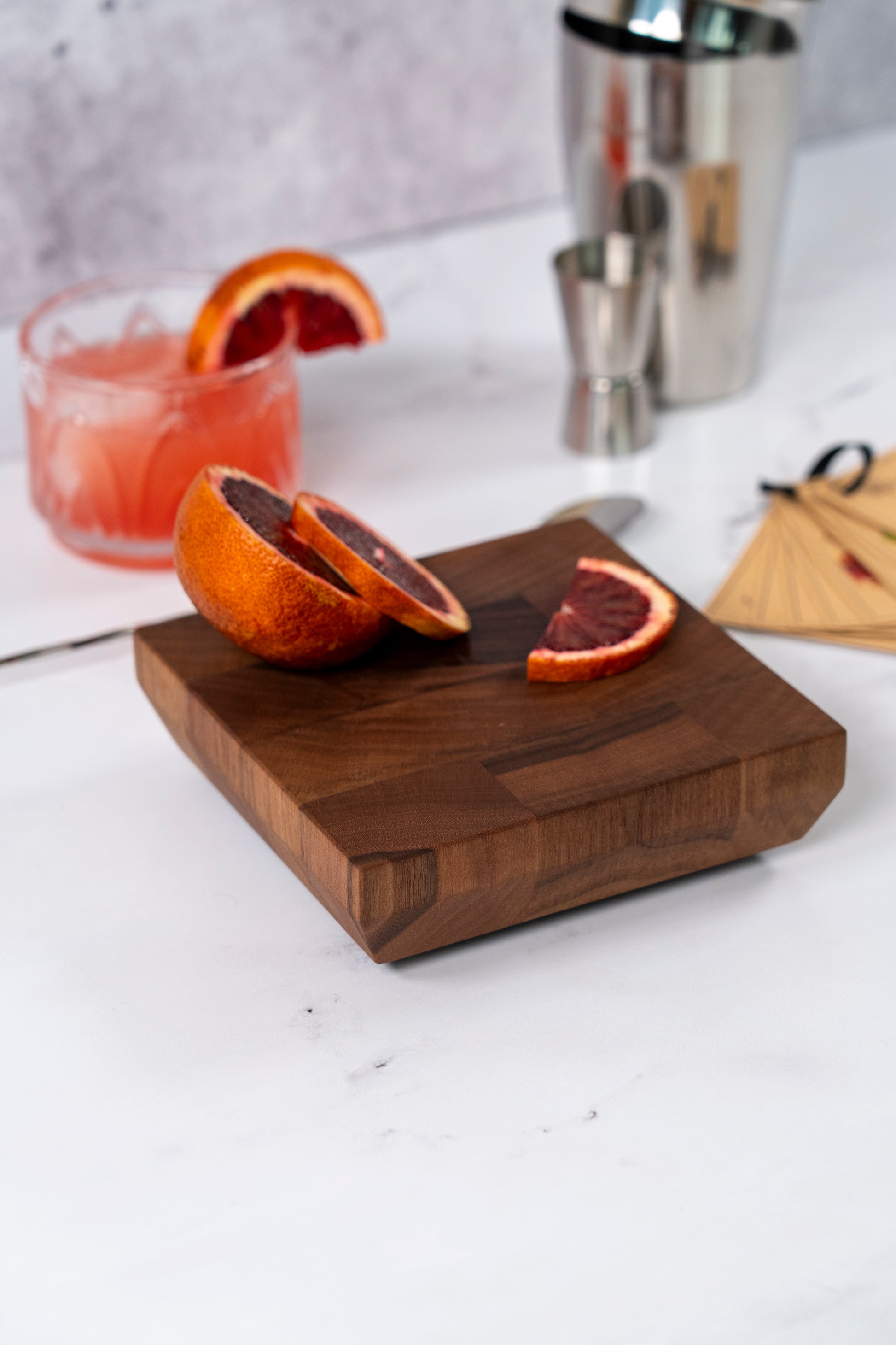 Small 6x6 end-grain cutting board with blood orange slices freshly cut next to a pink cocktail garnished with orange slice, small cutting board with tapered edges for bartender, accessory for home bar, cutting board for small chopping tasks ideal for fruits and herbs chopping